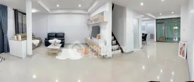 Spacious modern living room with elegant decor and open layout