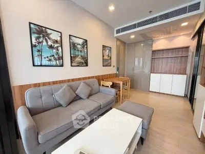Modern living room with stylish decor and cozy furniture in a contemporary apartment.