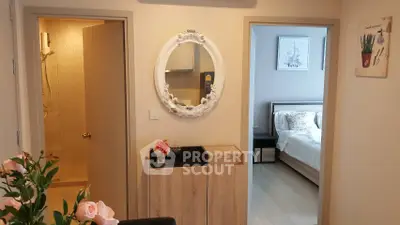 Charming interior view showcasing a cozy bedroom and stylish hallway with elegant decor.