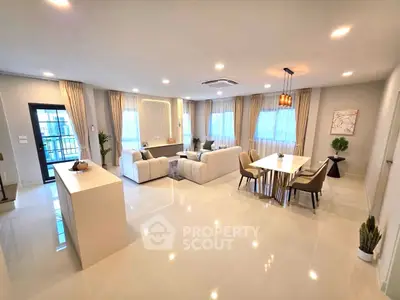 Spacious modern living room with elegant dining area and natural light