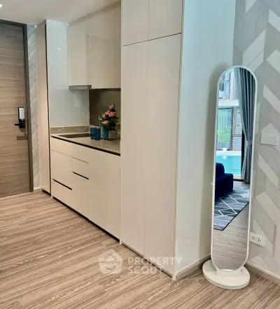 Modern apartment interior with sleek kitchen and stylish decor