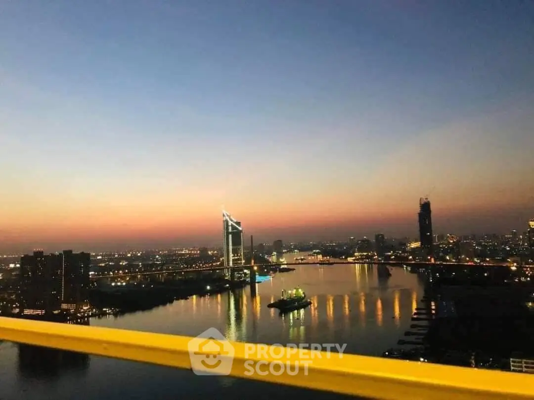 Stunning cityscape view with iconic skyline and serene waterfront at dusk.