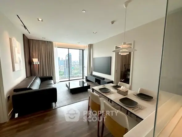 Modern living room with city view, sleek furniture, and dining area in luxury apartment.