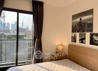 Cozy bedroom with city view and modern decor