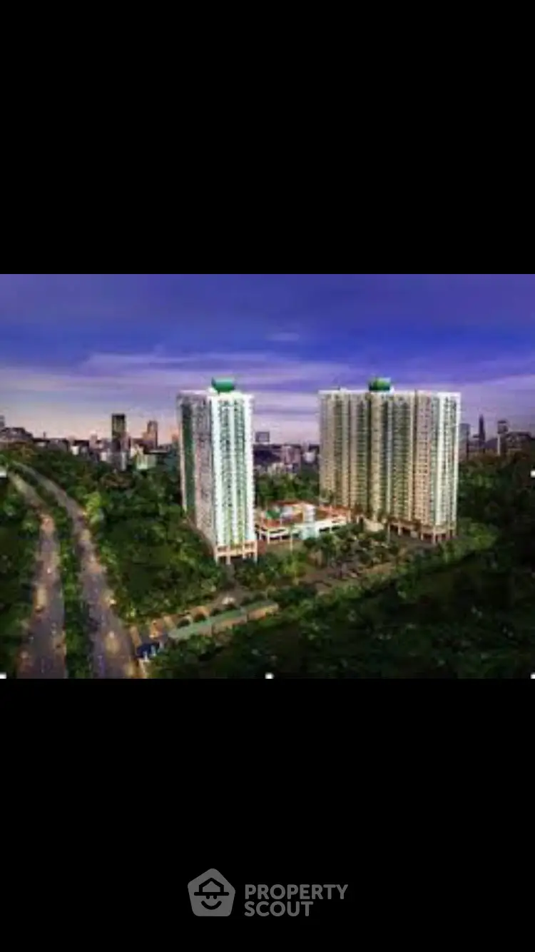 Stunning high-rise residential towers with lush green surroundings and cityscape views.