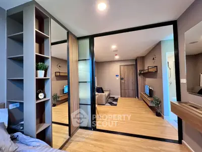 Modern living room with sliding glass doors and stylish decor