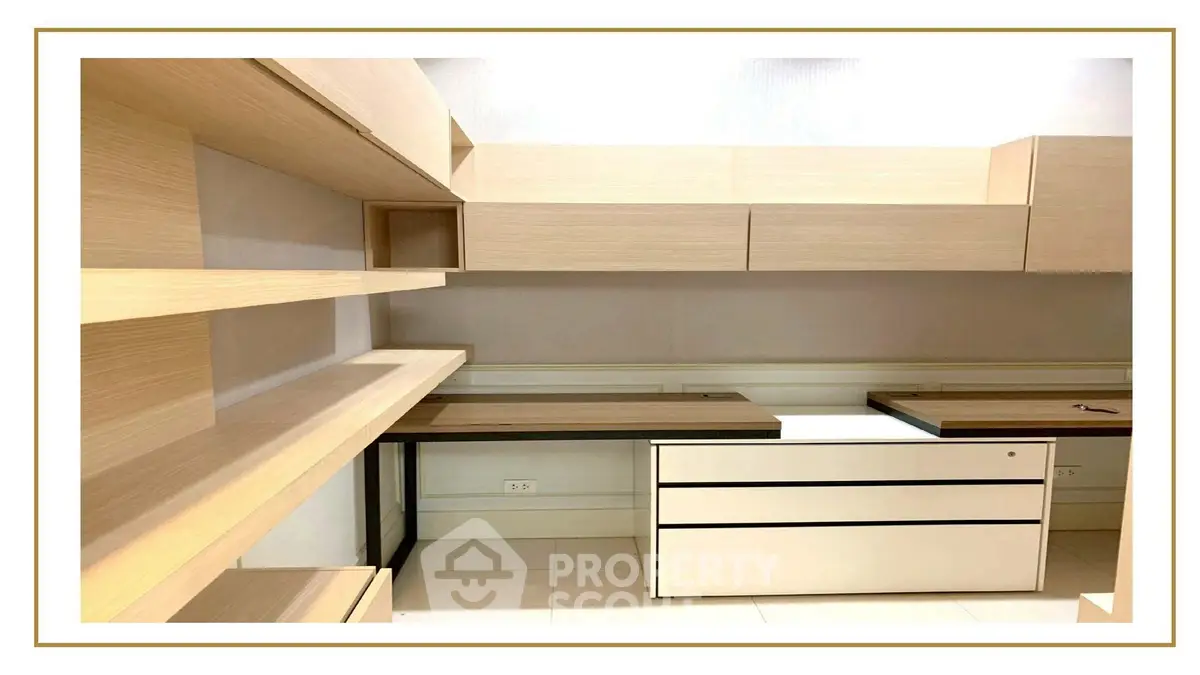 Modern study room with sleek wooden shelves and built-in desk