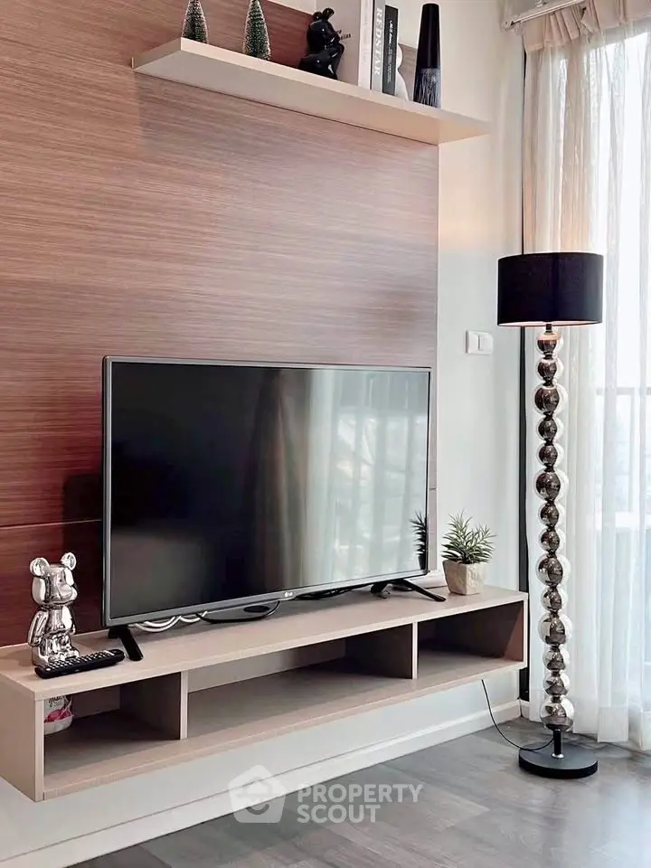 Modern living room with sleek TV setup and stylish decor