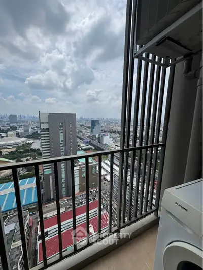 Stunning high-rise balcony view with cityscape and Samsung washing machine.