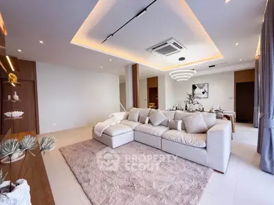 Luxurious modern living room with elegant decor and spacious seating area