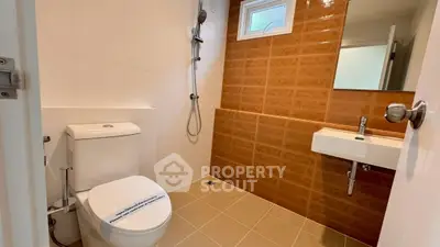 Modern bathroom with sleek fixtures and stylish tile design