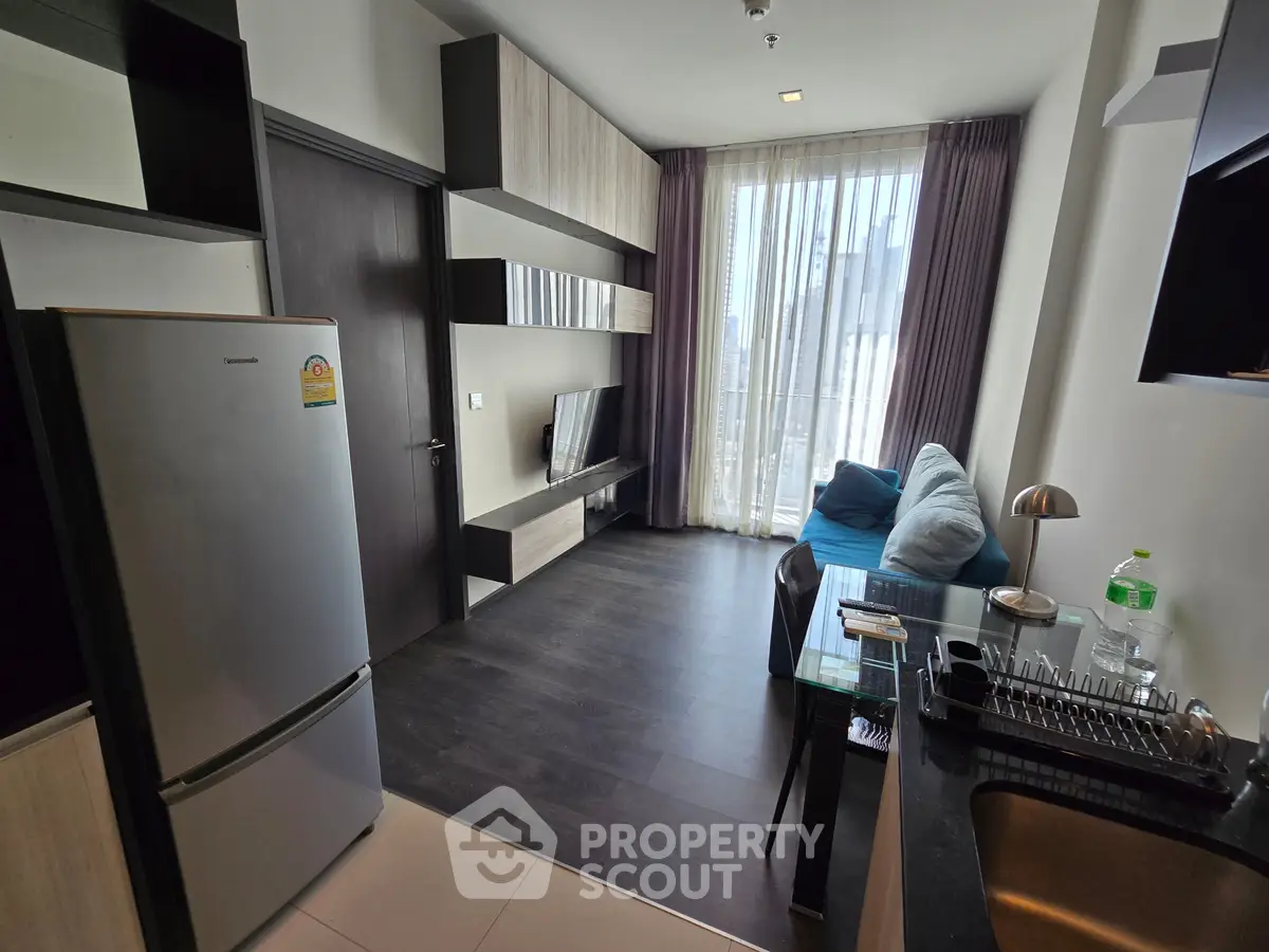 Modern apartment living room with sleek design and natural light