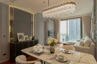 Luxurious living room with elegant chandelier and city view