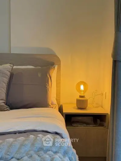 Cozy bedroom with warm lighting and stylish decor