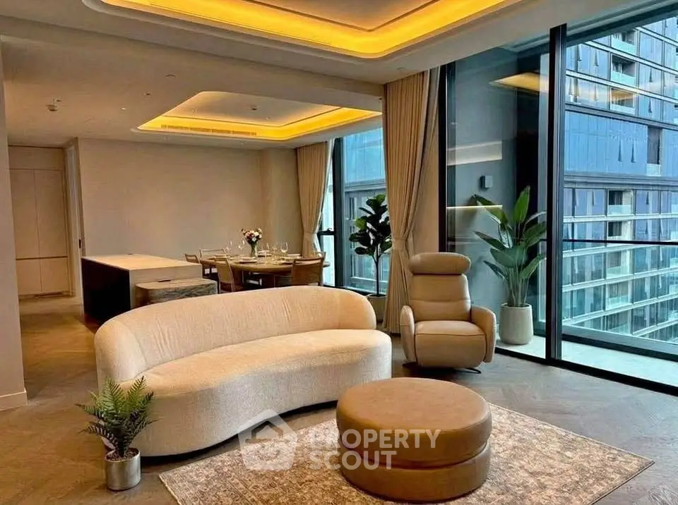 Luxurious modern living room with floor-to-ceiling windows and elegant furniture in a high-rise apartment.