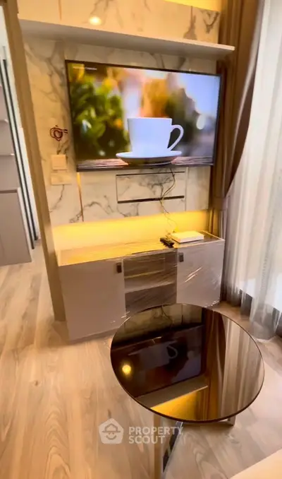 Modern living room with stylish TV setup and elegant decor