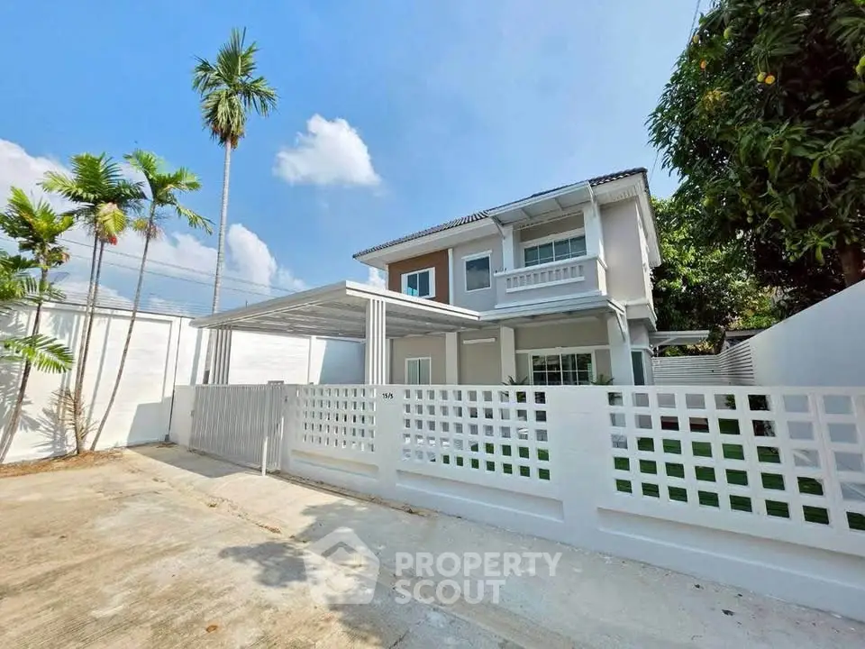 Stunning two-story house with modern design and spacious outdoor area, perfect for family living.