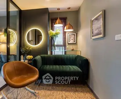 Stylish modern living room with velvet sofa and chic lighting