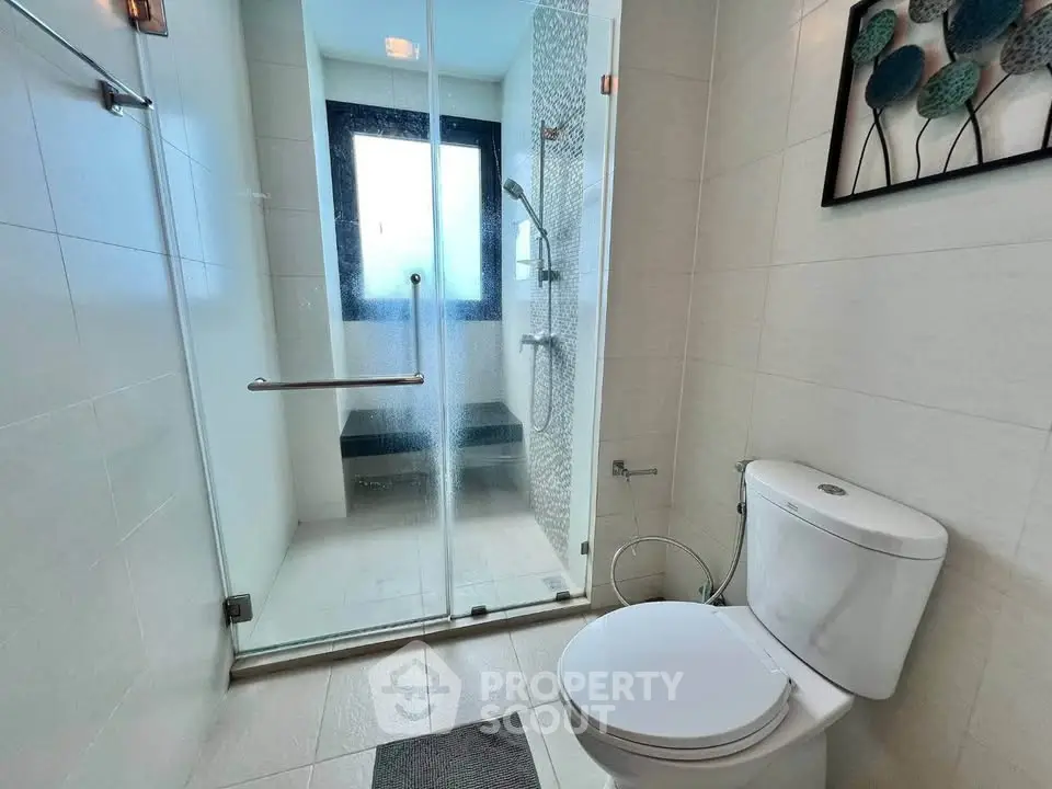Modern bathroom with glass shower and contemporary decor