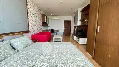 Stylish studio apartment with modern decor and cozy living area
