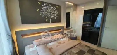 Modern bedroom with stylish decor and ample natural light