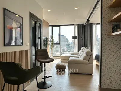 Modern living room with city view, stylish furniture, and natural light