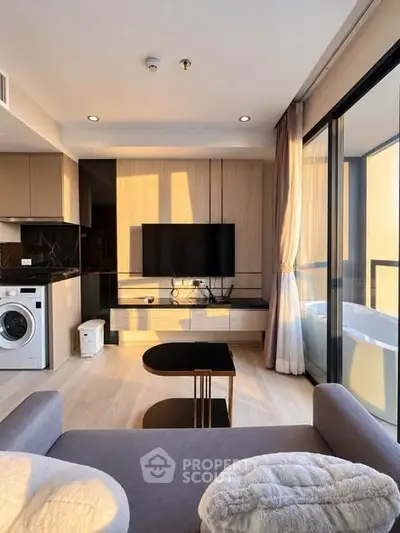 Modern living room with sleek furniture and large windows offering abundant natural light.