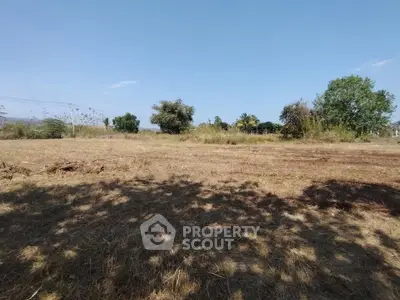Expansive vacant land with clear skies, ideal for development opportunities.
