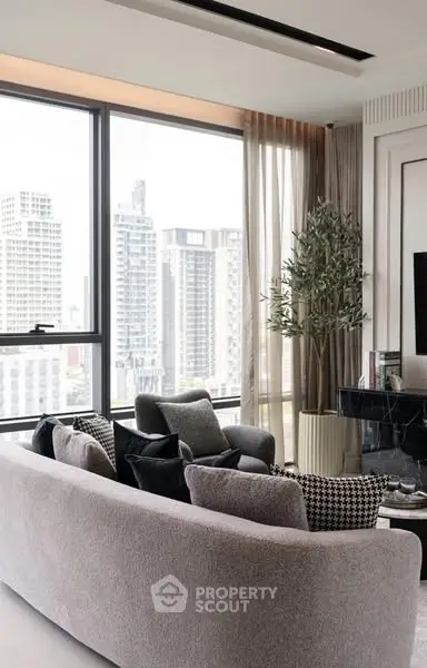 Modern living room with panoramic city view and stylish decor