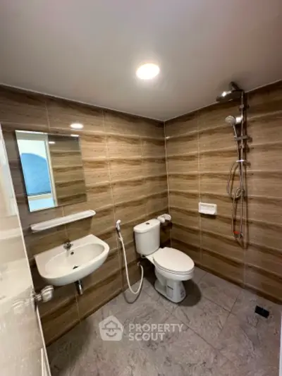 Modern bathroom with sleek fixtures and elegant tile design