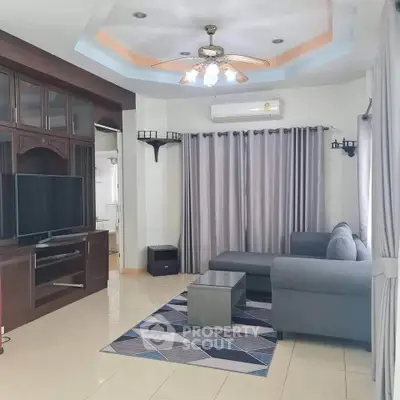 Stylish living room with modern furniture and elegant ceiling design