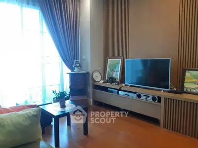 Stylish living room with modern decor and entertainment center