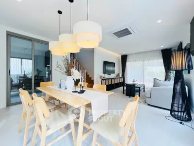 Spacious modern living room with dining area and stylish decor
