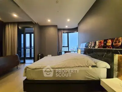Luxurious bedroom with city view and modern decor in high-rise apartment