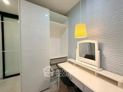 Modern study room with sleek white furniture and elegant lighting