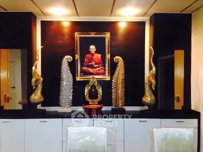 Elegant interior with unique decor and framed artwork, perfect for a sophisticated living space.