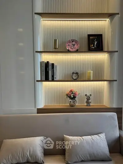 Elegant living room with modern shelving and ambient lighting