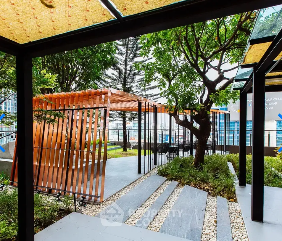 Modern garden area with stylish wooden pergola and lush greenery