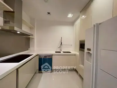 Modern kitchen with sleek appliances and minimalist design