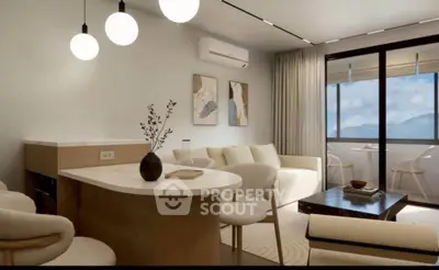 Modern living room with elegant furniture and large window offering scenic views.
