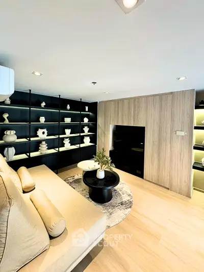 Modern living room with stylish decor and built-in shelving