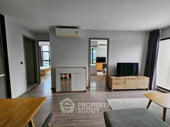 Modern living room with wooden furniture and natural light