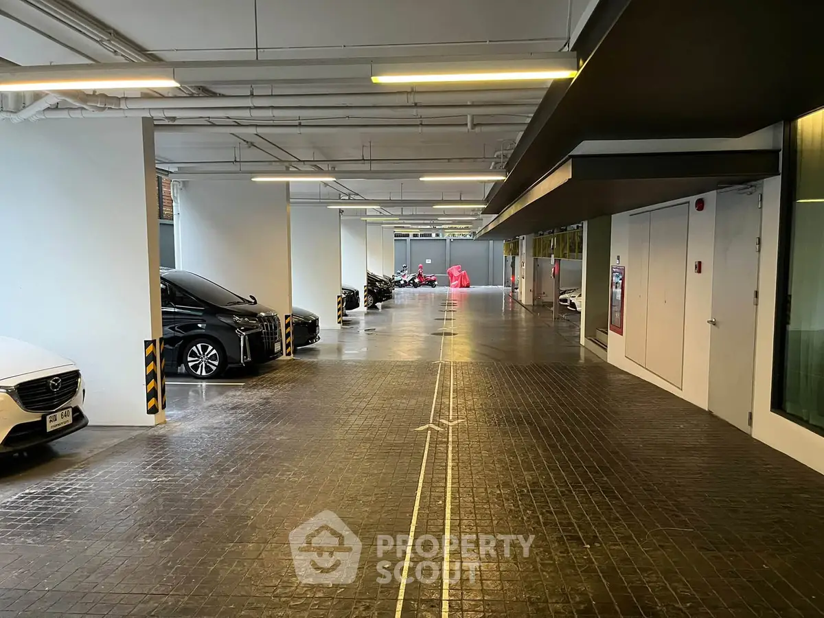 Modern parking garage with sleek design and ample space for vehicles.