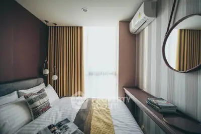 Stylish modern bedroom with cozy decor and natural light