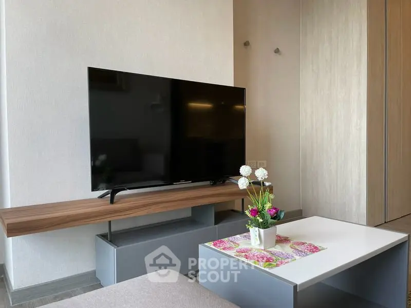 Modern living room with sleek TV setup and stylish decor