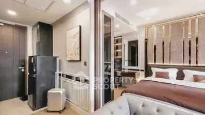 Luxurious modern bedroom with elegant decor and stylish furniture in a high-end apartment.