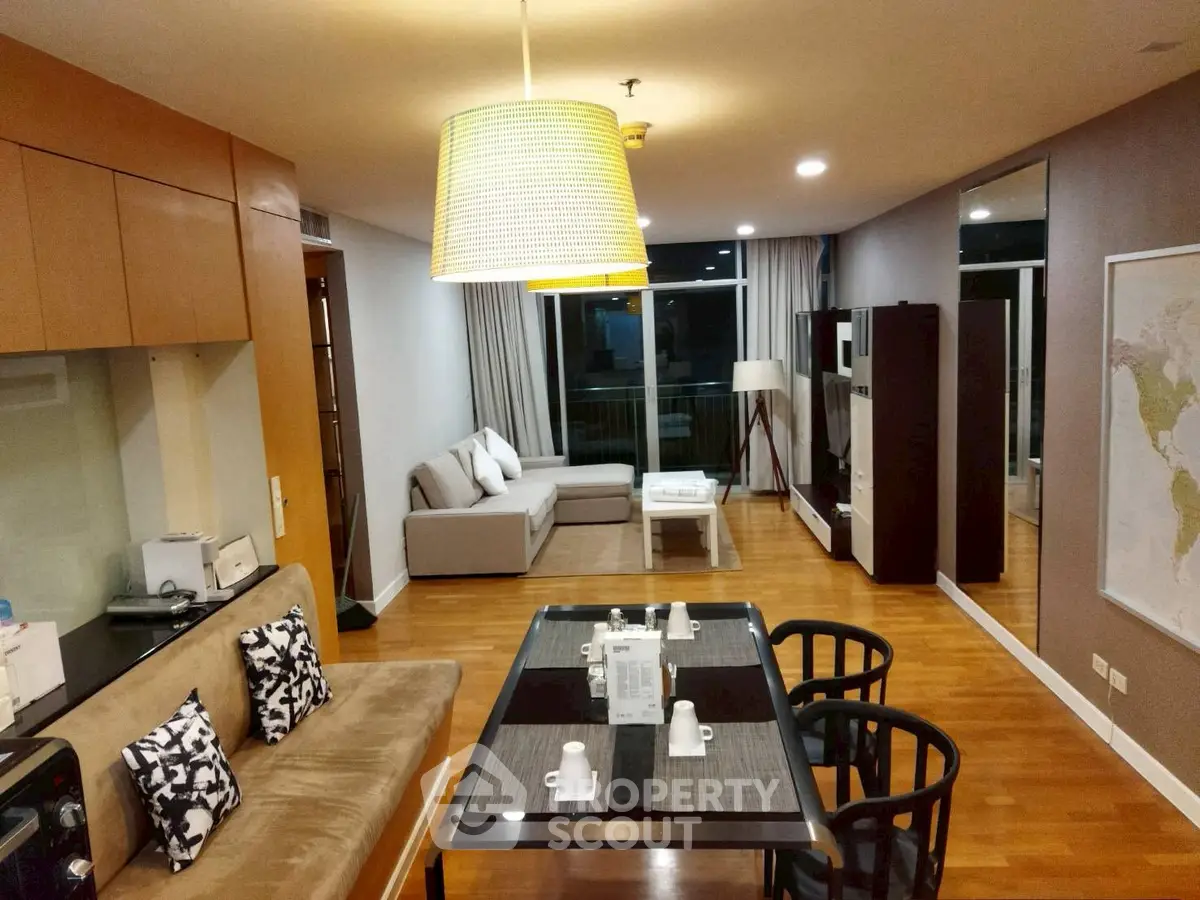 Spacious modern living room with elegant decor and wooden flooring