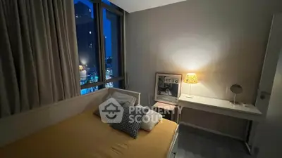 Cozy bedroom with city view, featuring modern decor and ambient lighting for a relaxing atmosphere.