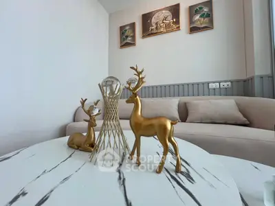 Stylish living room with modern decor and elegant marble table.