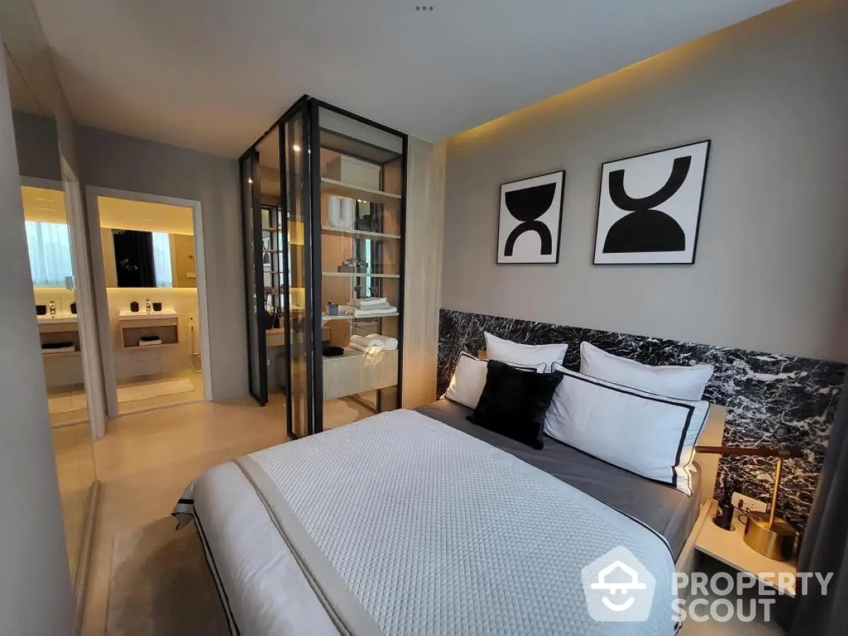 Luxurious modern bedroom with ensuite bathroom and stylish decor